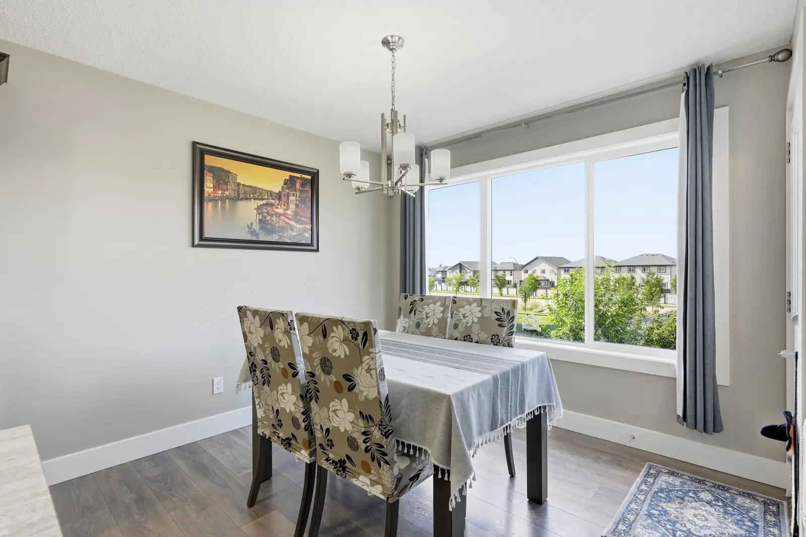 Dining area with large west-facing windows