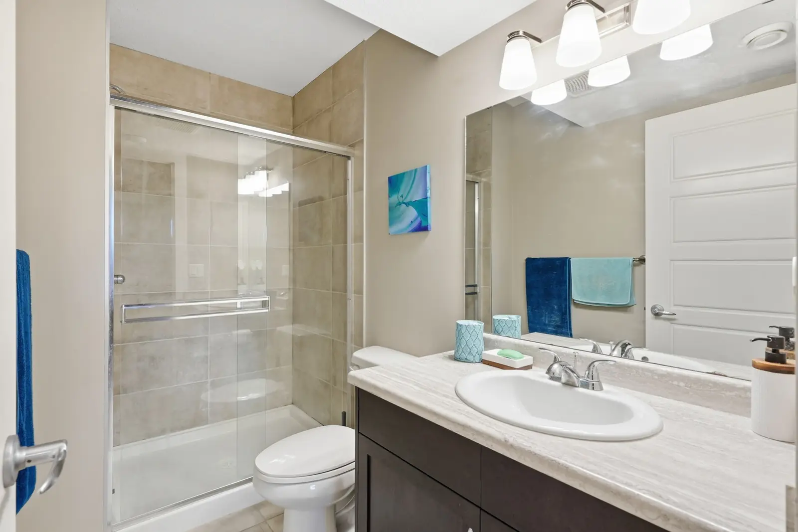 Lower level bathroom with a fully tiled walk-in shower